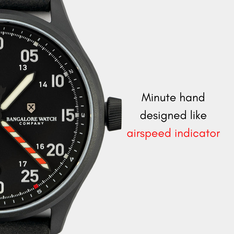 Minute hand of the MACH 1 Synchro wristwatch, designed with red and white accents like an airspeed indicator.